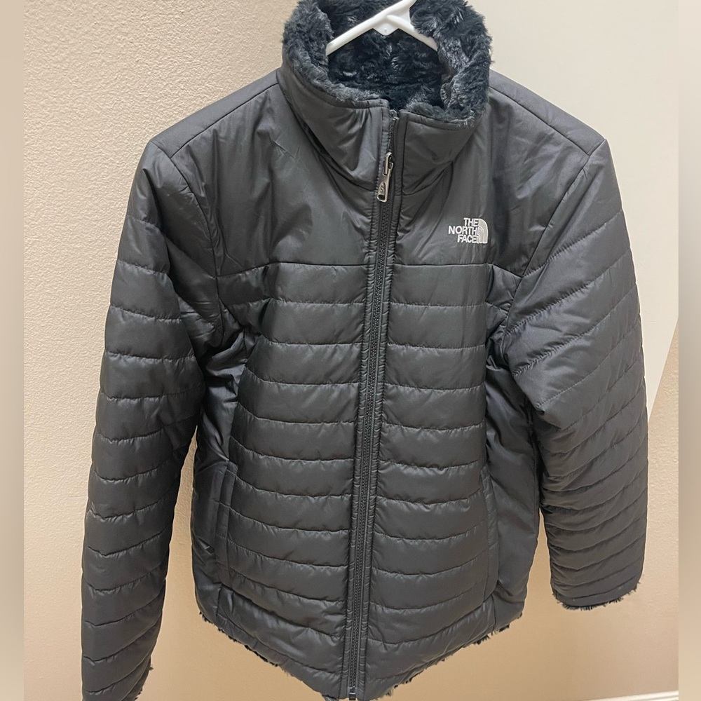 North Face Girls reversible jacket. The size is Girls XL and Black.
